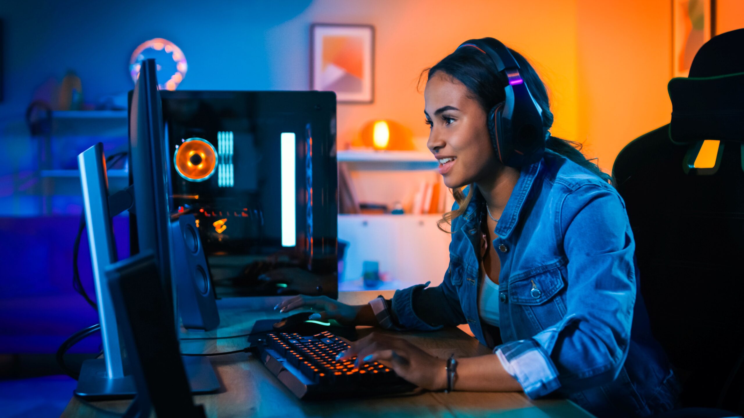 Minecraft Server: Gamer focused at PC with RGB lighting and headset in a modern gaming environment