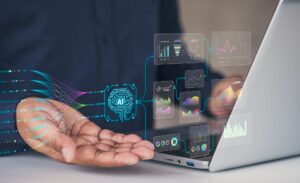 Visualization of AI data flow and analytics above laptop